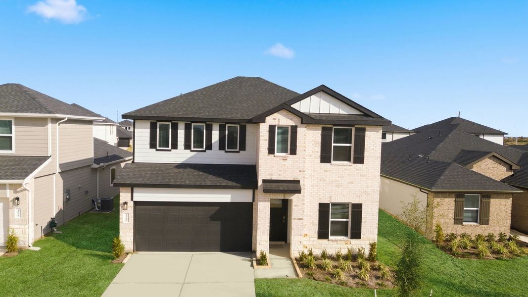 Front exterior of a new home in Sorrento, Richmond, TX, highlighting curb appeal (Image 2).