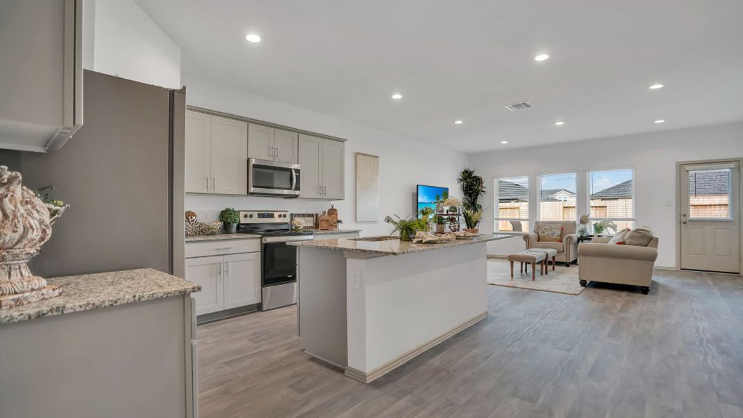 Representative furnished interior of a home built from the MITCHELL by D.R. Horton in Westward Pointe, Sealy (Image 5).