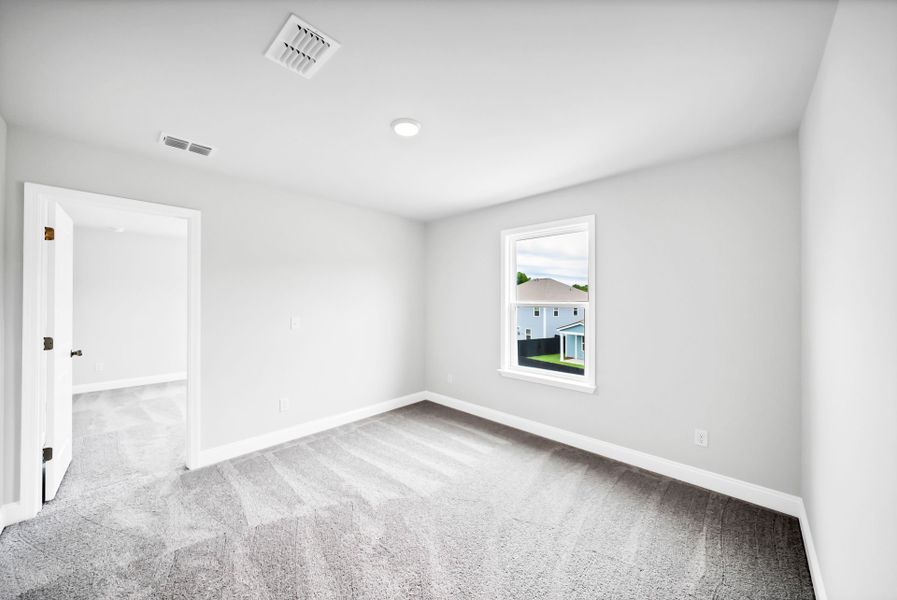 Spacious, unfurnished interior of a new home in Monroe Preserve, Chapin (Image 51).