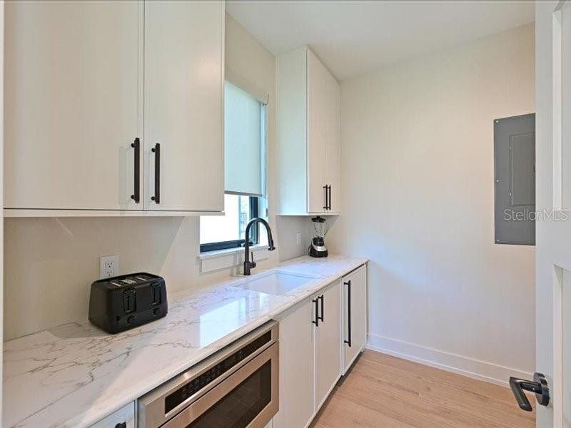 Furnished interior view inside a new home in , Anna Maria (Image 8).