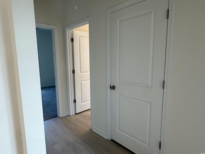 Full bathroom featuring a garden tub and vanity Full bathroom featuring a garden tub and vanity