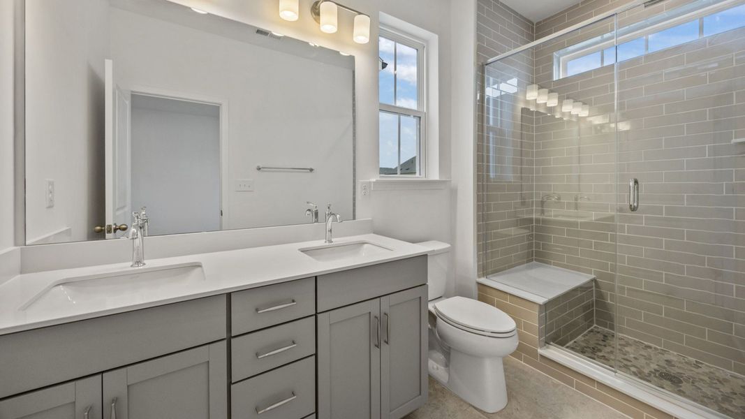 The Landon Plan in River District by DBR Homes in Charlotte, N.C - Bathroom