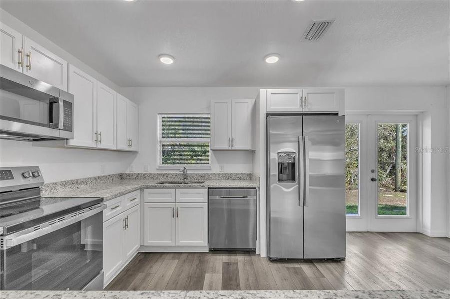 Furnished interior view inside a new home in , Punta Gorda (Image 9).