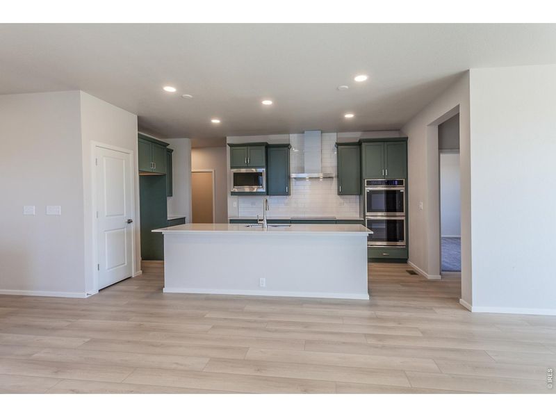 Furnished interior view inside a new home in Prairie Song Story Collection - Single Family Homes, Windsor (Image 5).