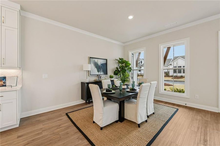 Furnished interior view inside a new home in Promenade at Sawnee Village, Cumming (Image 8).