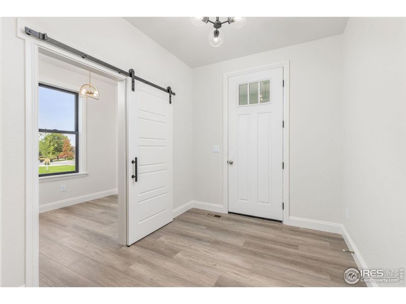 Spacious, unfurnished interior of a new home in Cottages at Kelly Farm, Greeley (Image 30).