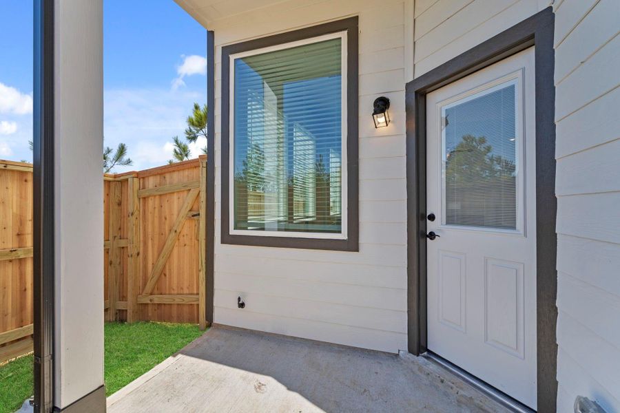 Exterior details and patio area of a home in Woodforest, Montgomery (Image 4).