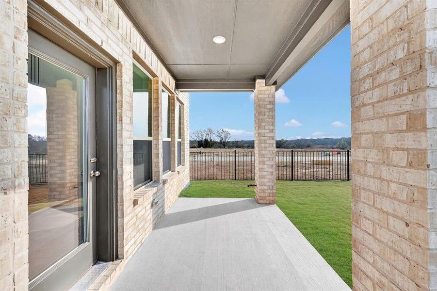Exterior details and patio area of a home in Lily Creek at Sutton Fields, Aubrey (Image 24). Exterior details and patio area of a home in Lily Creek at Sutton Fields, Aubrey (Image 24).