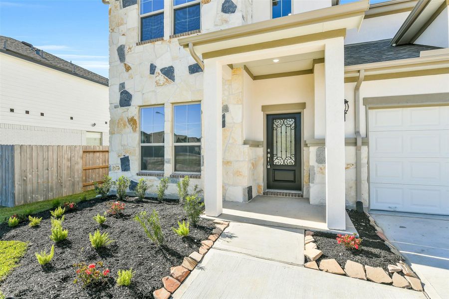 Exterior details and patio area of a home in Stone Creek Ranch, Hockley (Image 4).