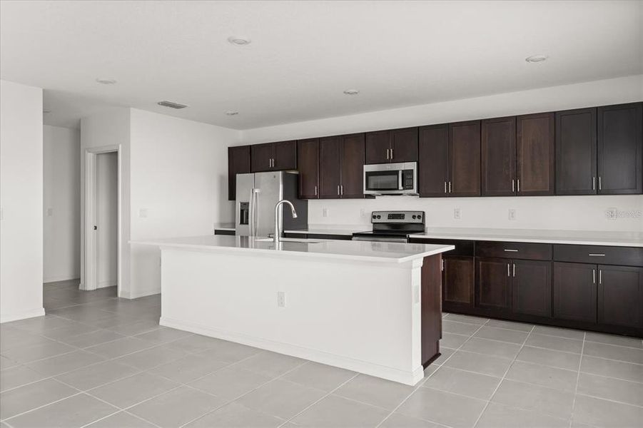 Furnished interior view inside a new home in Parkside at Cherry Lake, Groveland (Image 7). Furnished interior view inside a new home in Parkside at Cherry Lake, Groveland (Image 7).