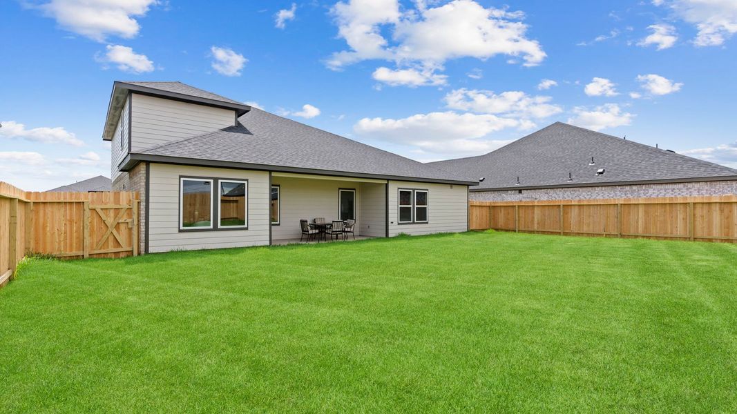 Exterior details and patio area of a home in Tamarron, Fulshear (Image 21). Exterior details and patio area of a home in Tamarron, Fulshear (Image 21).