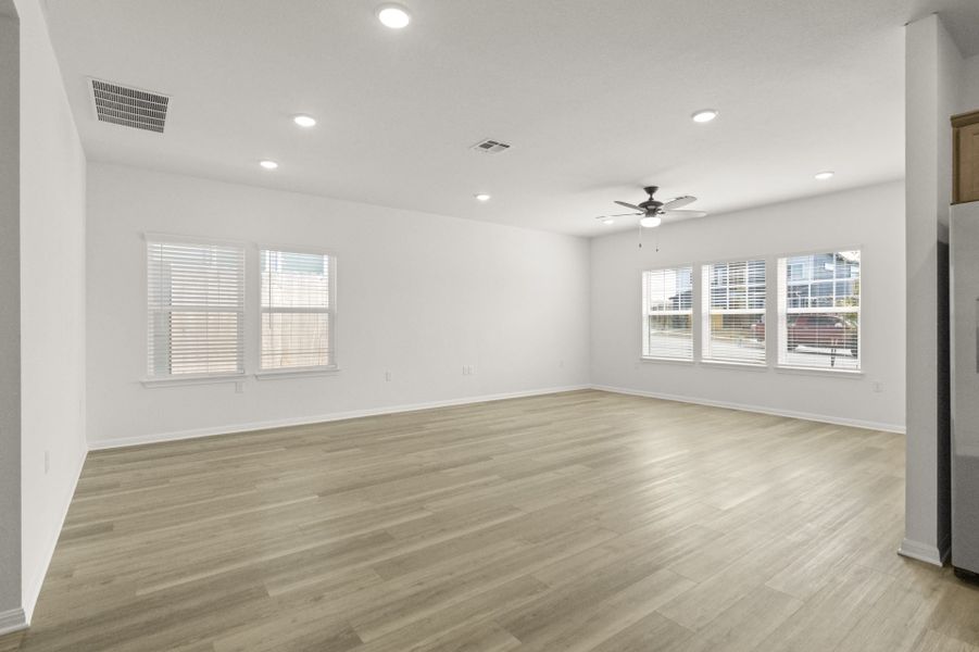 Spacious, unfurnished interior of a new home in Whisper Valley, Manor (Image 17).