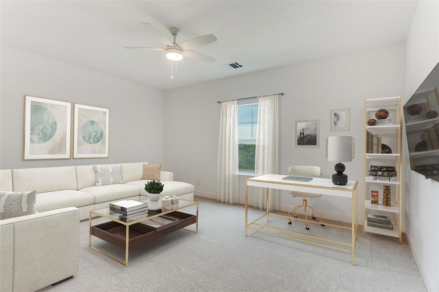 Carpeted living room with an office area and ceiling fan