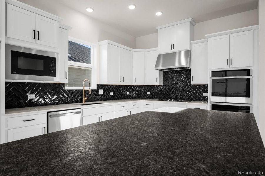 Furnished interior view inside a new home in Wolf Ranch - Enclave Collection, Colorado Springs (Image 25).