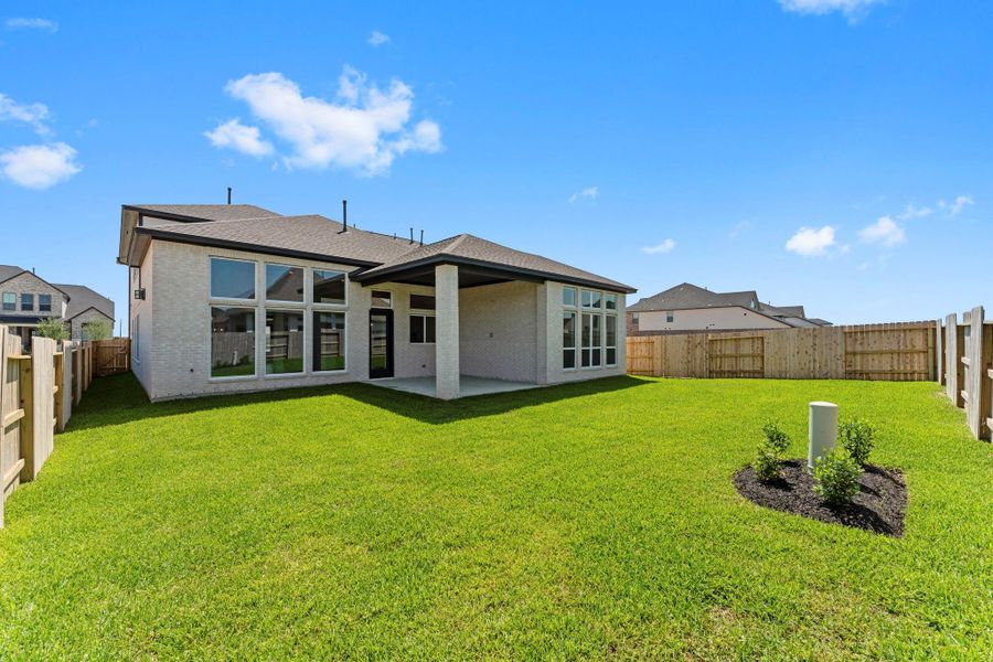 Exterior details and patio area of a home in The Grand Prairie 60’s, Hockley (Image 3).