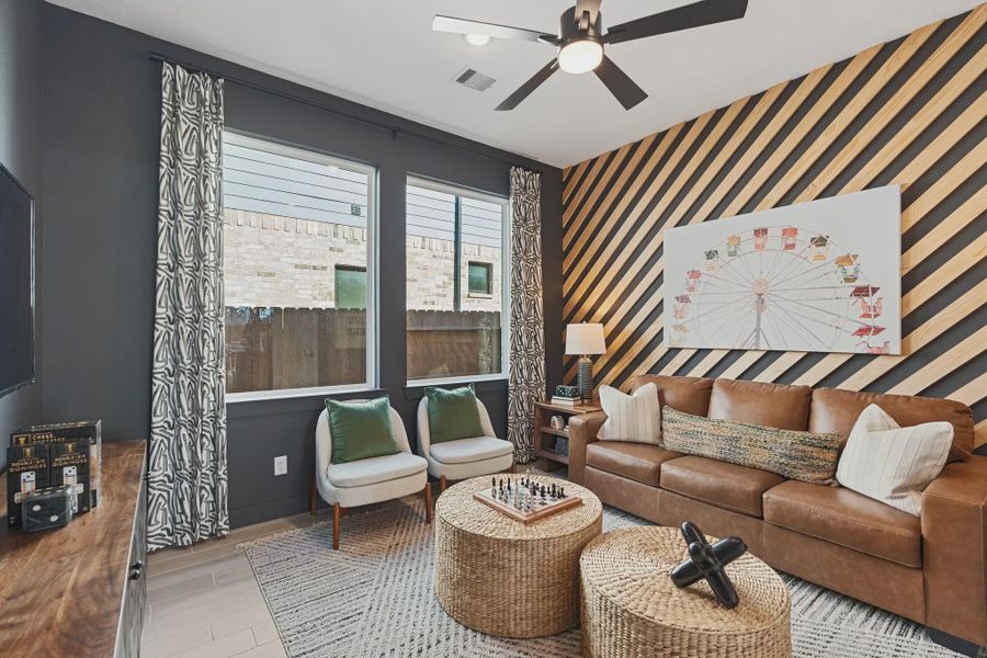 Representative furnished interior of a home built from the Sweetwater by Chesmar Homes in Meridiana 50's and 60's, Manvel (Image 7).