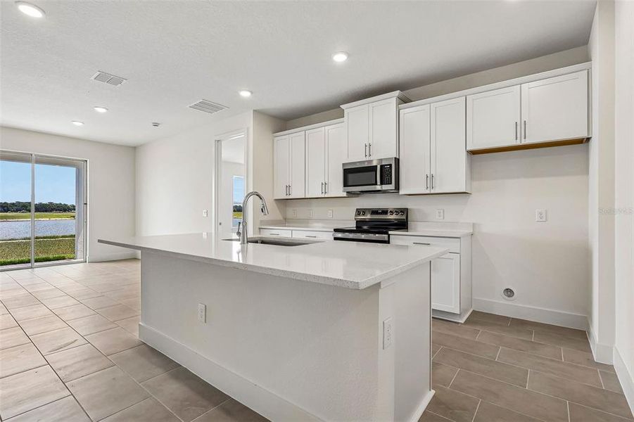 Furnished interior view inside a new home in Lakeside at Satilla, St. Cloud (Image 5).