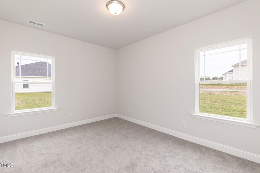 Representative unfurnished interior of a home built from the 2913 by Adams Homes in Hidden Pines, Cameron (Image 30).