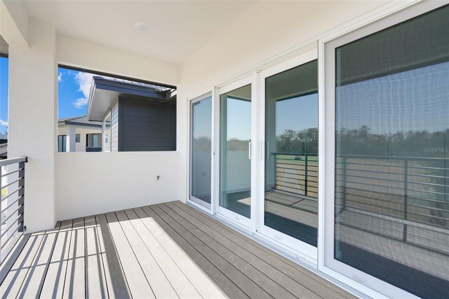 Exterior details and patio area of a home in Hampton Green at Providence, Davenport (Image 31).
