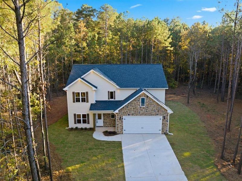 Front exterior of a new home in , Whitesburg, GA, highlighting curb appeal (Image 2).