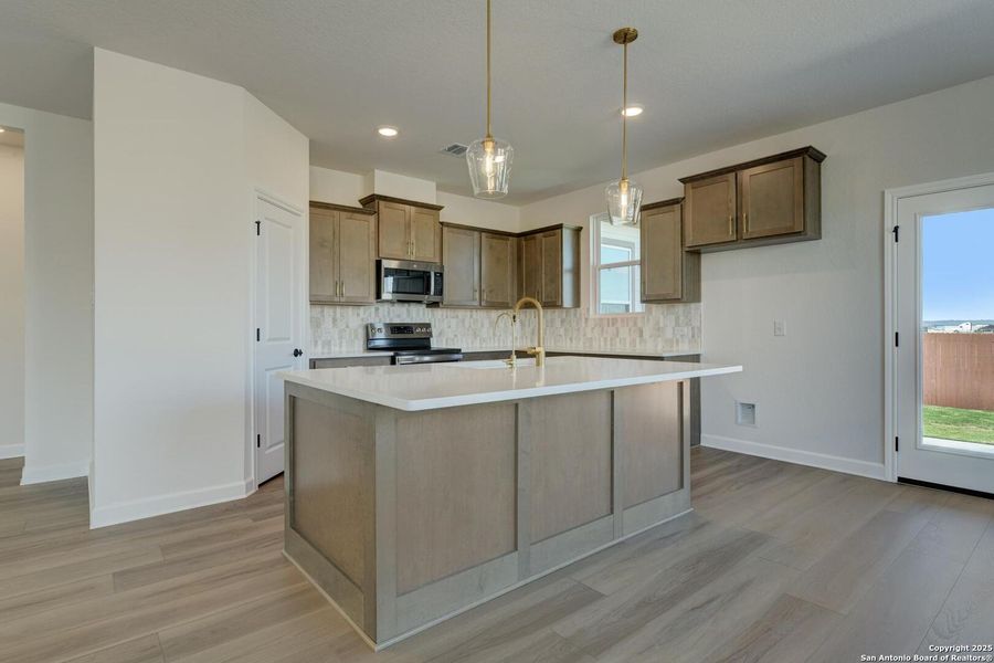Furnished interior view inside a new home in Megan's Landing 50's, Castroville (Image 10).