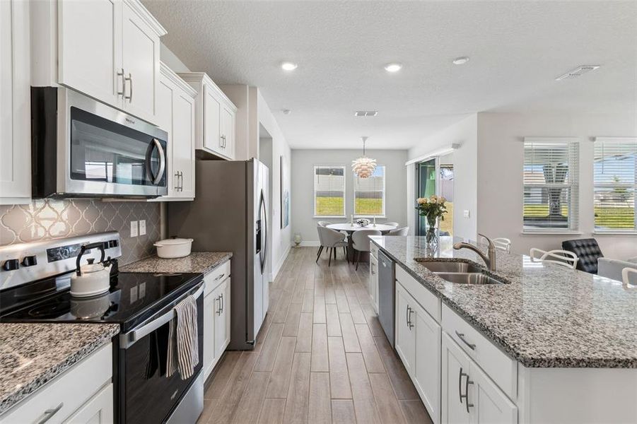 Furnished interior view inside a new home in , Winter Garden (Image 12). Furnished interior view inside a new home in , Winter Garden (Image 12).