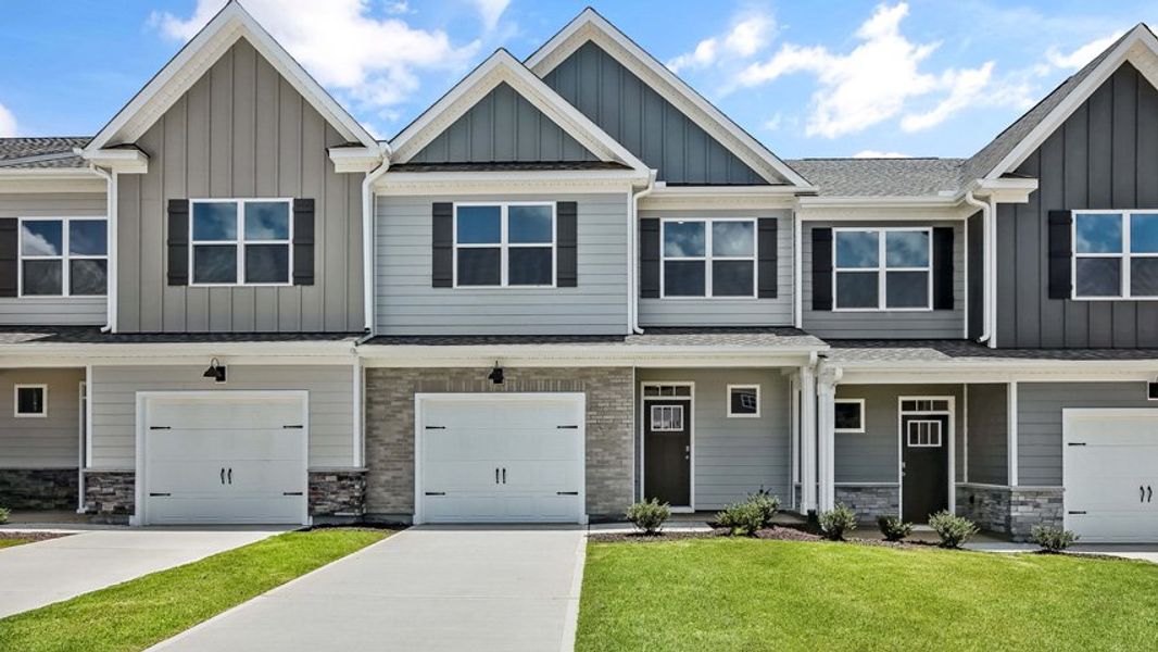 Representative exterior photo of a completed home built from the DANIEL by D.R. Horton in The Townes Park, Apex, NC (Image 17). Representative exterior photo of a completed home built from the DANIEL by D.R. Horton in The Townes Park, Apex, NC (Image 17).