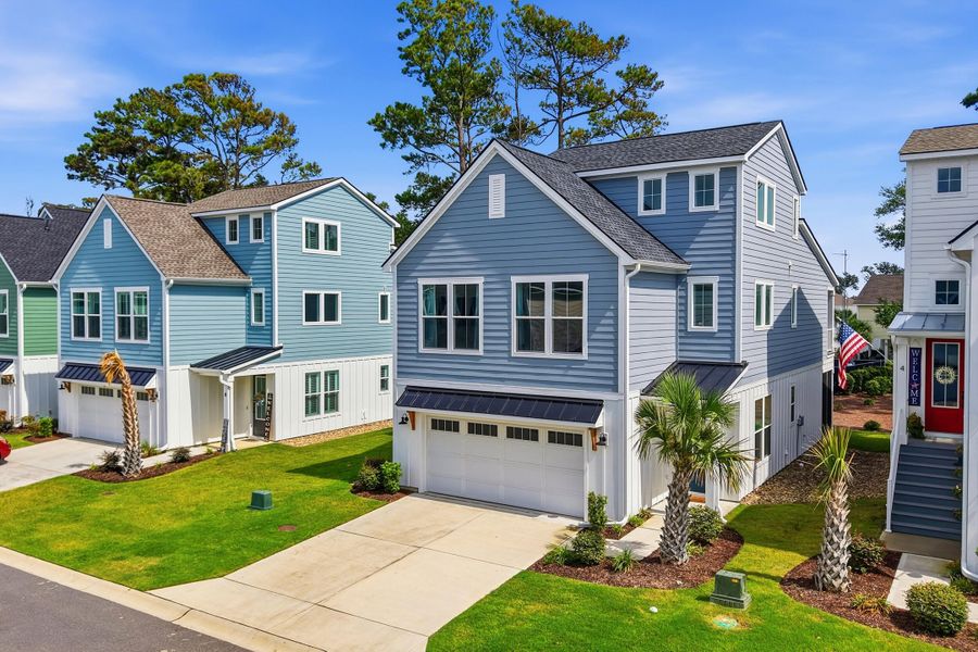 Front exterior of a new home in , North Myrtle Beach, SC, highlighting curb appeal (Image 28). Front exterior of a new home in , North Myrtle Beach, SC, highlighting curb appeal (Image 28).