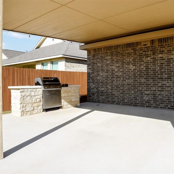 Exterior details and patio area of a home in Heartland: Classic Collection, Crandall (Image 18). Exterior details and patio area of a home in Heartland: Classic Collection, Crandall (Image 18).