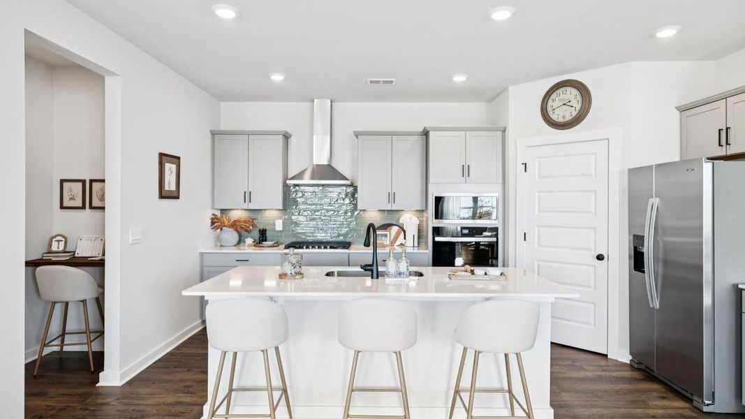 Representative furnished interior of a home built from the IRWIN A by D.R. Horton in Harvest Point, Spring Hill (Image 19).