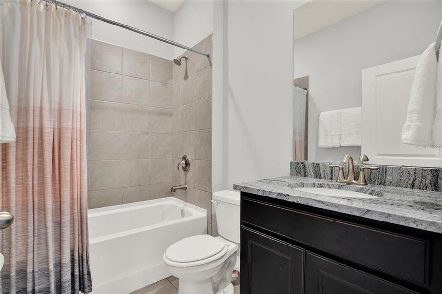 Furnished interior view inside a new home in Woodcreek, Wesley Chapel (Image 31).