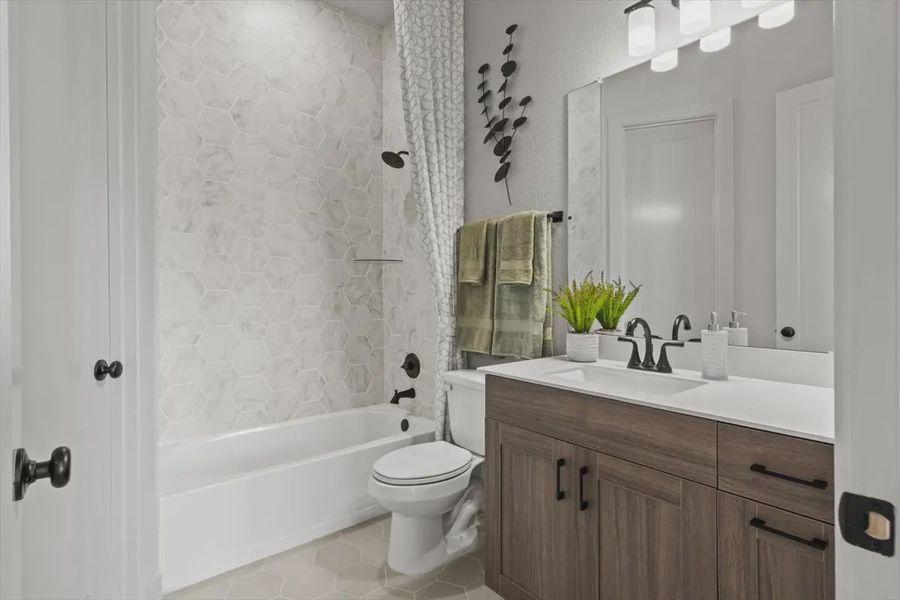 Representative furnished interior of a home built from the Malani by Chesmar Homes in Attwater 65's, Waller (Image 13).