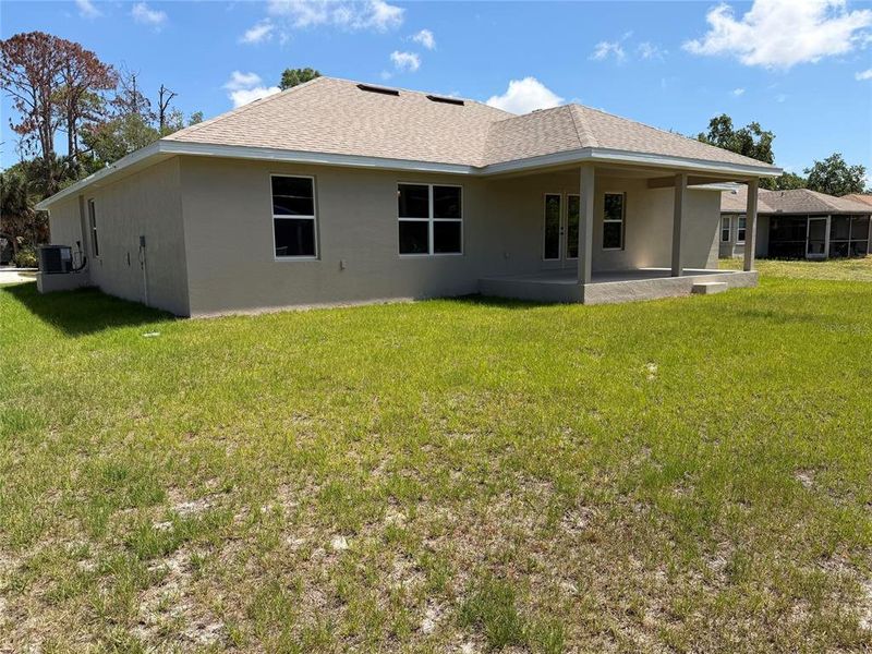 Exterior details and patio area of a home in Port Charlotte, Port Charlotte (Image 3).