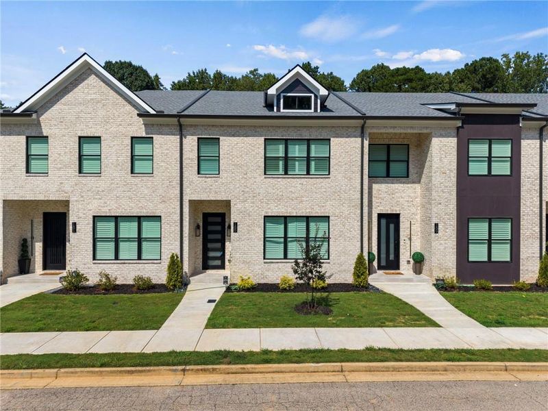Front exterior of a new home in , Stockbridge, GA, highlighting curb appeal (Image 24).
