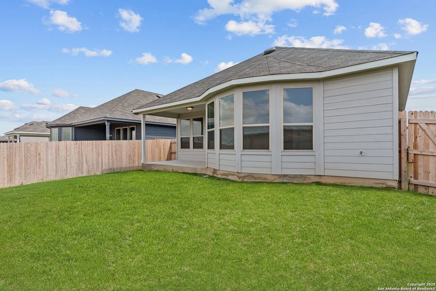 Front exterior of a new home in Horizon Ridge, San Antonio, TX, highlighting curb appeal (Image 2).