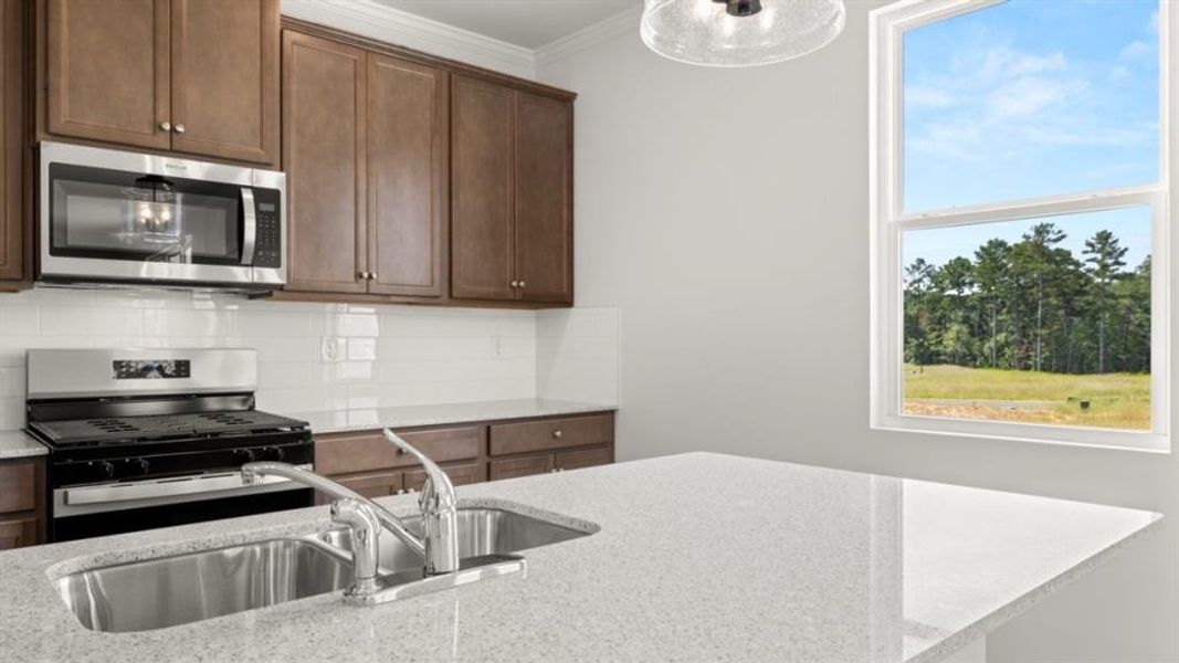 Furnished interior view inside a new home in Fairway 17 at Mirror Lake, Villa Rica (Image 10).