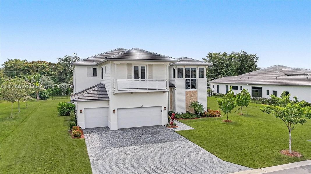 Front exterior of a new home in , Davie, FL, highlighting curb appeal (Image 25).