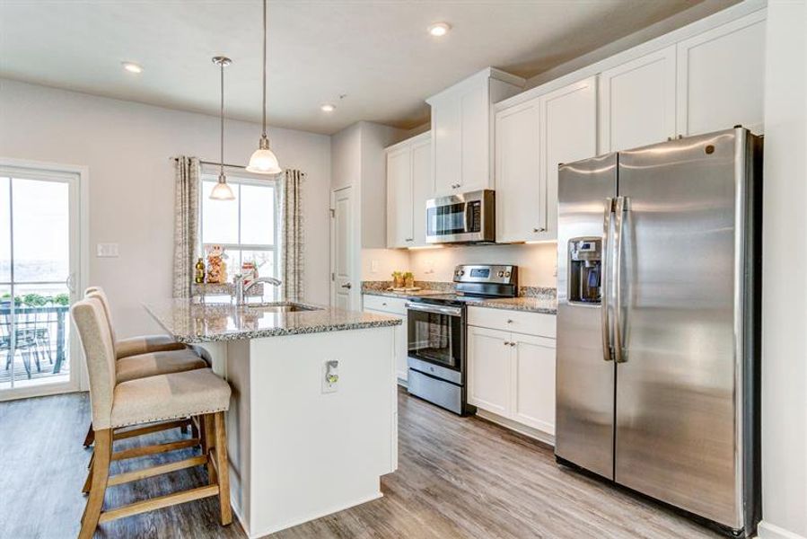 Furnished interior in a model home at Village Square in Lebanon (Image 7).