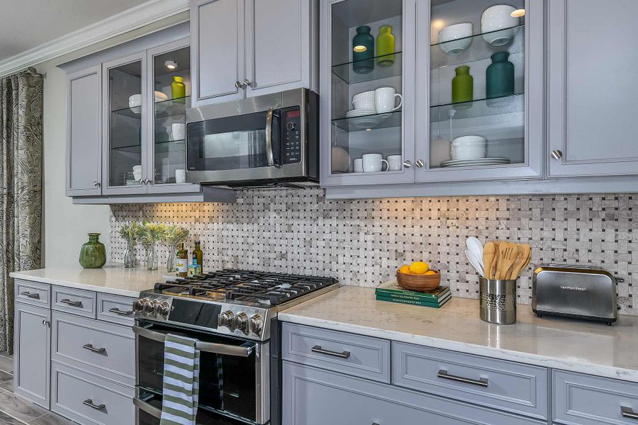Furnished interior view inside a new home in Boca Royale Golf & Country Club at Wellen Park, Englewood (Image 18).