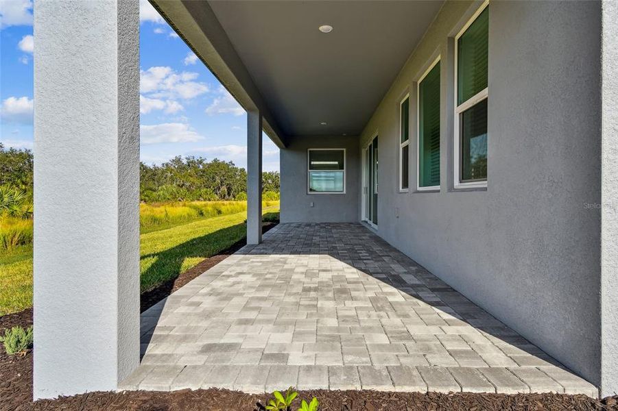 Exterior details and patio area of a home in Creeks Edge at Twin Rivers, Parrish (Image 4). Exterior details and patio area of a home in Creeks Edge at Twin Rivers, Parrish (Image 4).