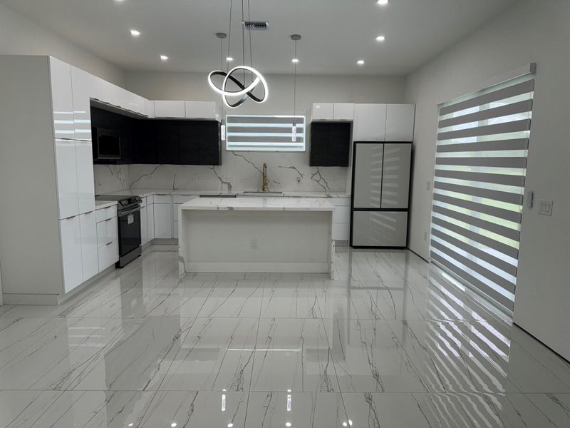 Furnished interior view inside a new home in , Port St. Lucie (Image 7).