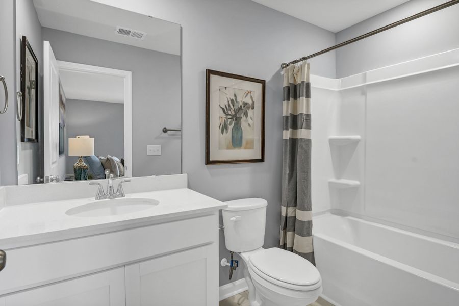 Representative furnished interior of a home built from the Jarrod by Veranda Homes in Trenton Place, Roebuck (Image 42).