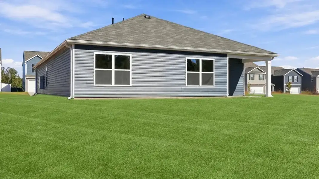 Exterior details and patio area of a home in Waverly Station, Greenwood (Image 4).