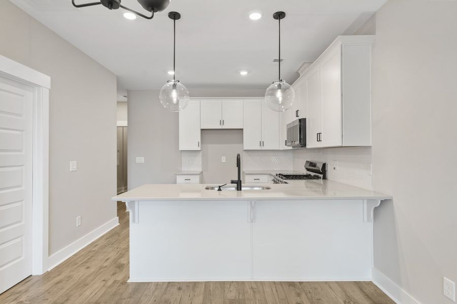 Representative furnished interior of a home built from the Holland by Hunter Quinn Homes in Renaissance Place, Greenville (Image 11).