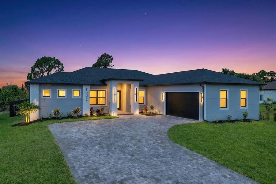 Front exterior of a new home in , Port Charlotte, FL, highlighting curb appeal (Image 21). Front exterior of a new home in , Port Charlotte, FL, highlighting curb appeal (Image 21).