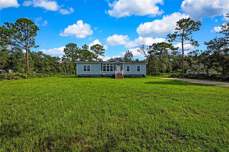 Front exterior of a new home in , Homosassa, FL, highlighting curb appeal (Image 26).
