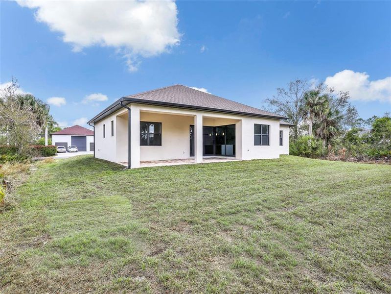 Exterior details and patio area of a home in , Port Charlotte (Image 4).