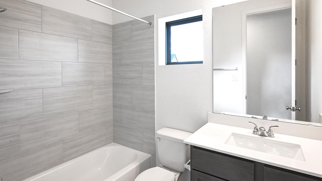 Furnished interior view inside a new home in Crosswinds, Kyle (Image 9).