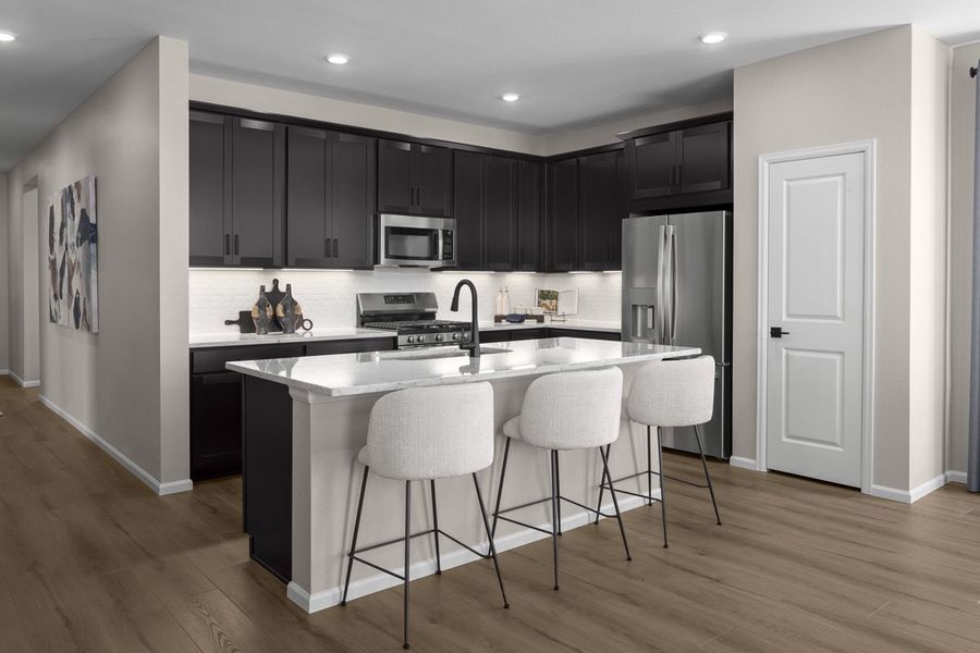 Representative furnished interior of a home built from the 1818 Modeled by KB Home in Bennett Crossing Reserve, Bennett (Image 4).