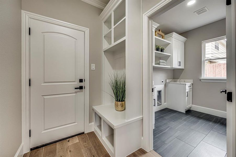 Mudroom featuring dark hardwood / wood-style floors